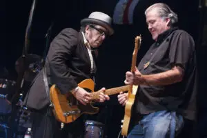susana millman photo of elvis costello and david hidalgo seva OAKLAND Concert