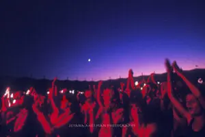 Audience cheers at twilight at Cal expo
